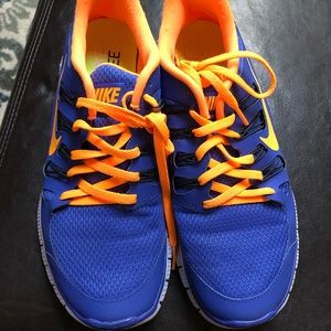 Nike Free running shoe, women’s sz 9.5. Royal blue w/orange accents. EUC